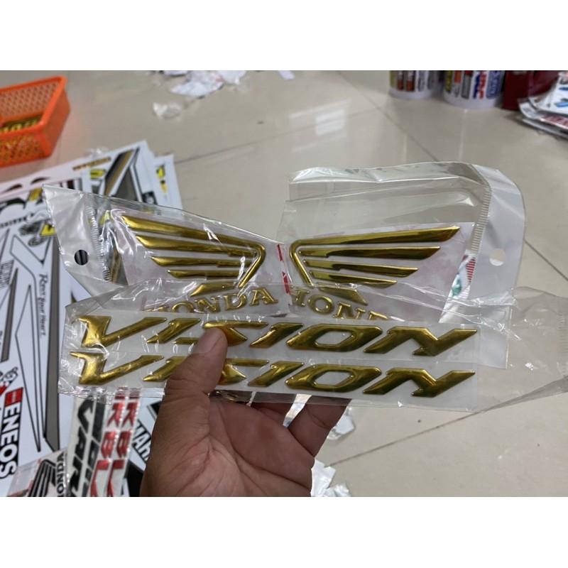 Cánh chim chữ vision vàng nhựa xi dẻo