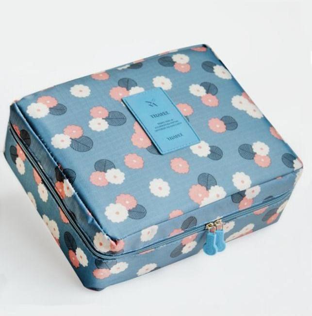 Túi đựng mỹ phẩm xanh họa tiết hoa