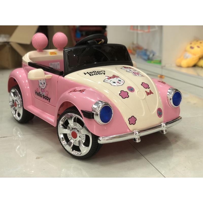 Ô TÔ điện trẻ em helo kity mèo cho các bé gái có điều khiển từ xa nhạc đèn cho bé