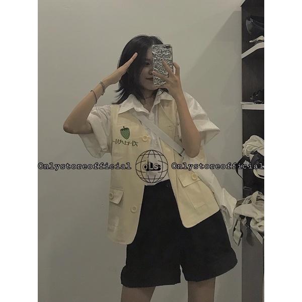 Áo gile dâu be với áo sơ mi trắng cơ bản và quần đùi đenxinh xắn