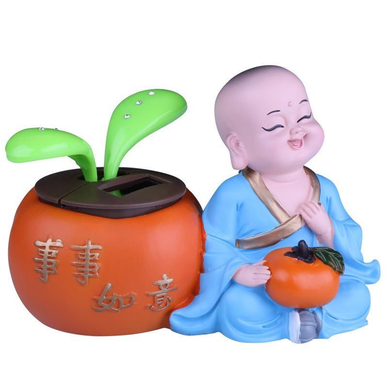 Tượng Chú Tiểu An Nhiên Cạnh Mầm Cây Bồ Đề Lắc Lư Bằng Năng Lượng Mặt Trời Trang Trí Taplo Oto Tặng Chuỗi Vòng 216 Hạt
