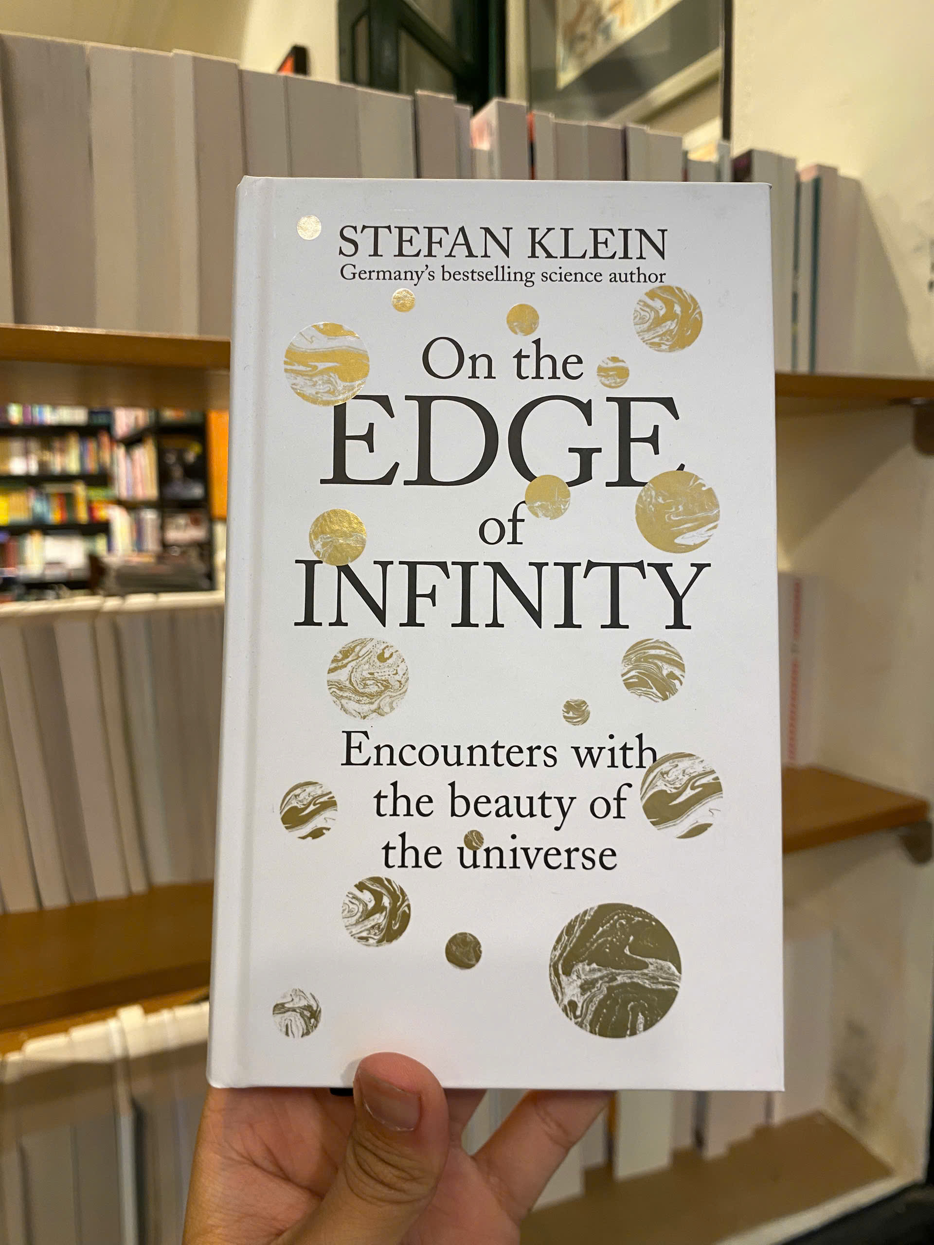 Sách - On the Edge of Infinity by Stefan Klein - Science/Nonfiction book in English - Bìa Cứng