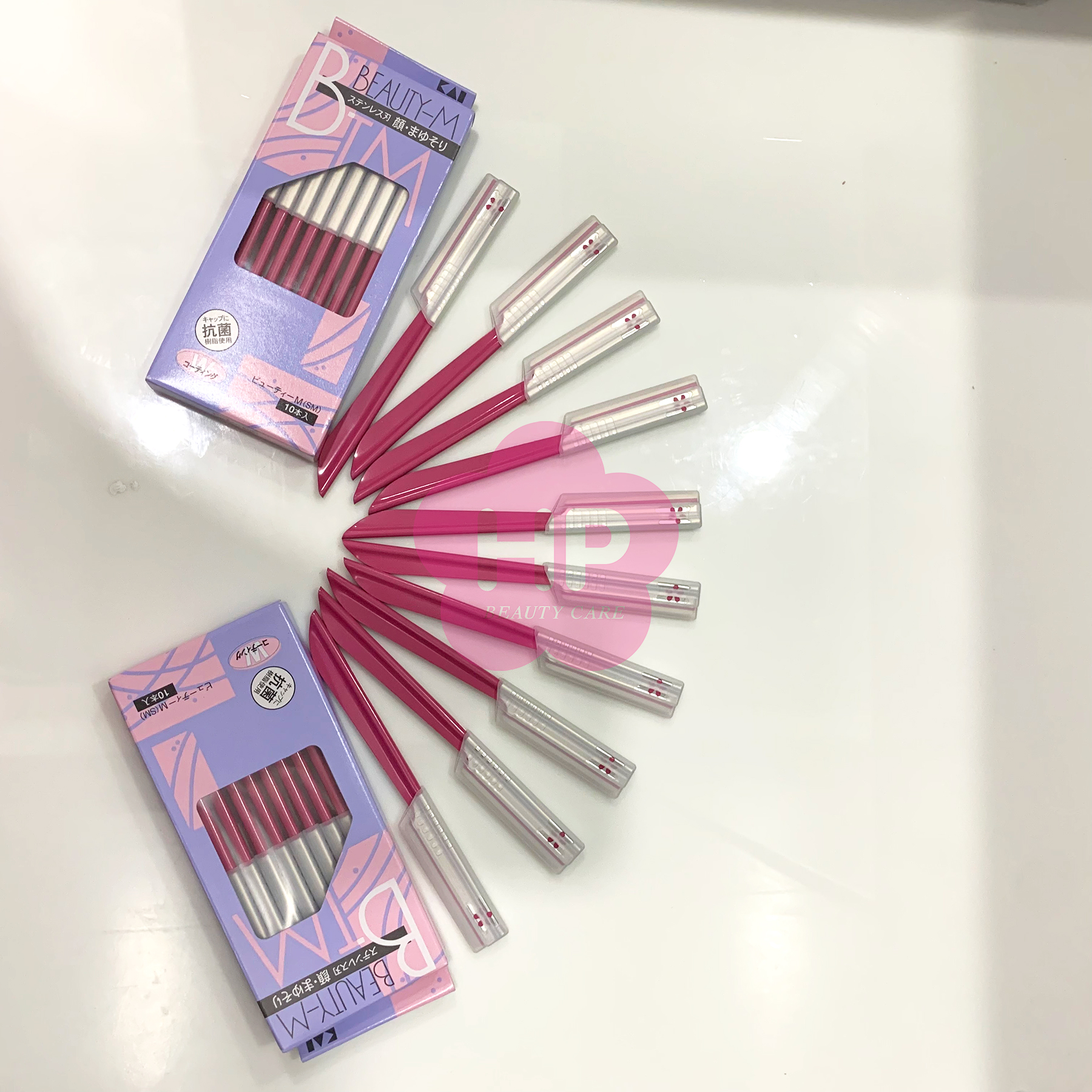 Dao Cạo Lông Mày Cán Dài Bằng Thép Không Gỉ Kai Razor 00743 BTM-10H1 Dành Cho Nữ (Set 10 Cây)