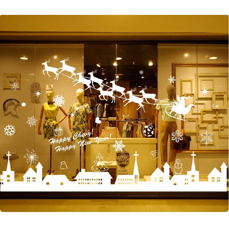 Decal trang trí noel thành phố tuyết và xe tuần lộc
