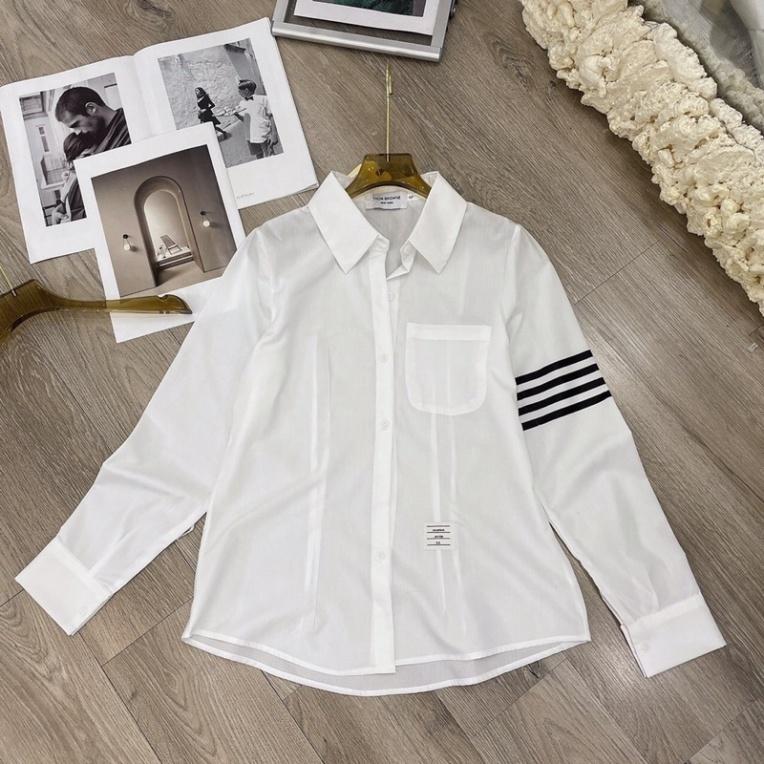 Áo sơ mi nữ trắng dáng công sở viền sọc tay