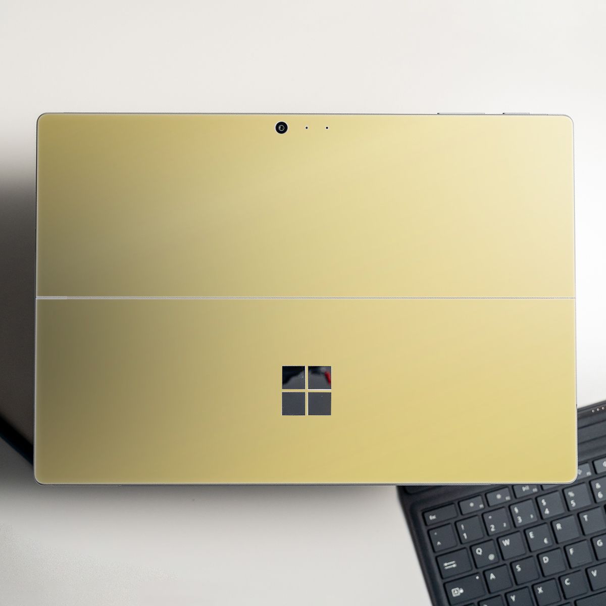 Skin dán hình Aluminum Chrome vàng gold cho Surface Go, Pro 2, Pro 3, Pro 4, Pro 5, Pro 6, Pro 7, Pro X