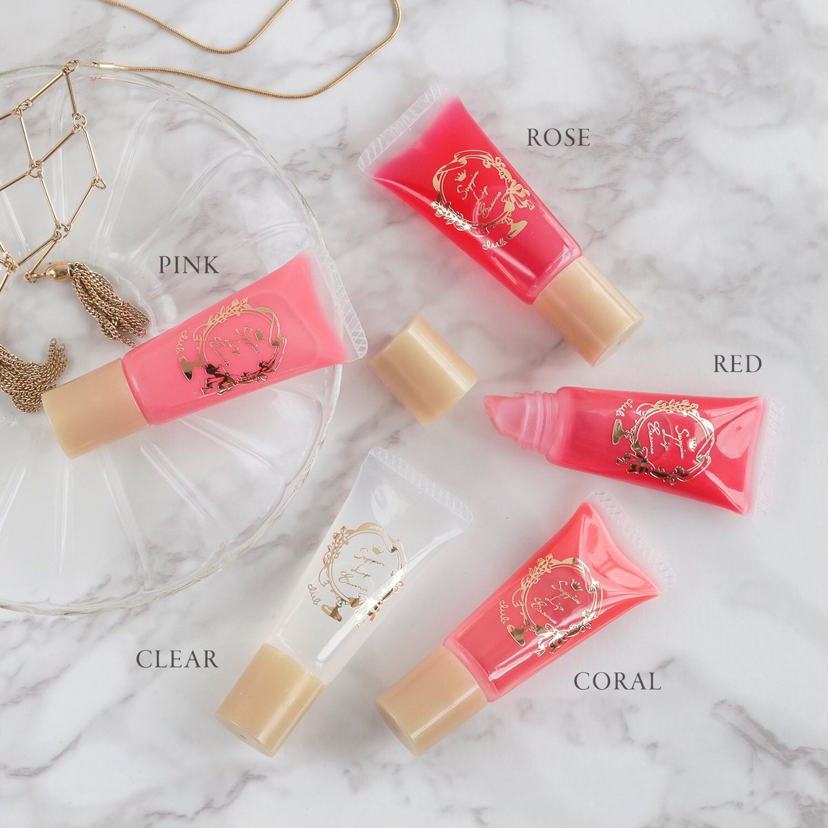 Son dưỡng Club Suppin Lip Essence 04 coral - Màu san hô