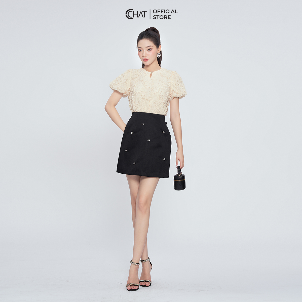 Chân Váy Dáng Ngắn Chữ A Đính Đá Chất Tafta Cao Cấp Phong Cách Thanh Lịch 13CNB9001AT