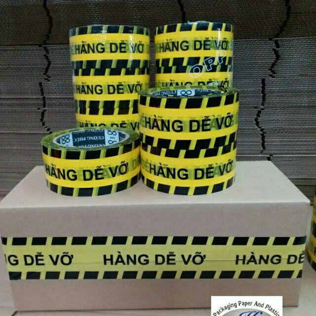 Băng keo 100YA in chữ HÀNG DỄ VỠ siêu tiết kiệm siêu dính chắc chắn, dẻo dai, bám dính tốt