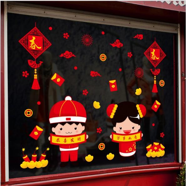 Decal trang trí tết - Bé Trai Bé Gái cầm tờ liễu câu đố mừng Xuân