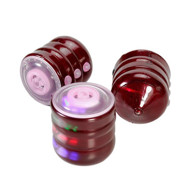 Con Quay Spinner Nhựa Có Đèn Và Nhạc Cho Bé