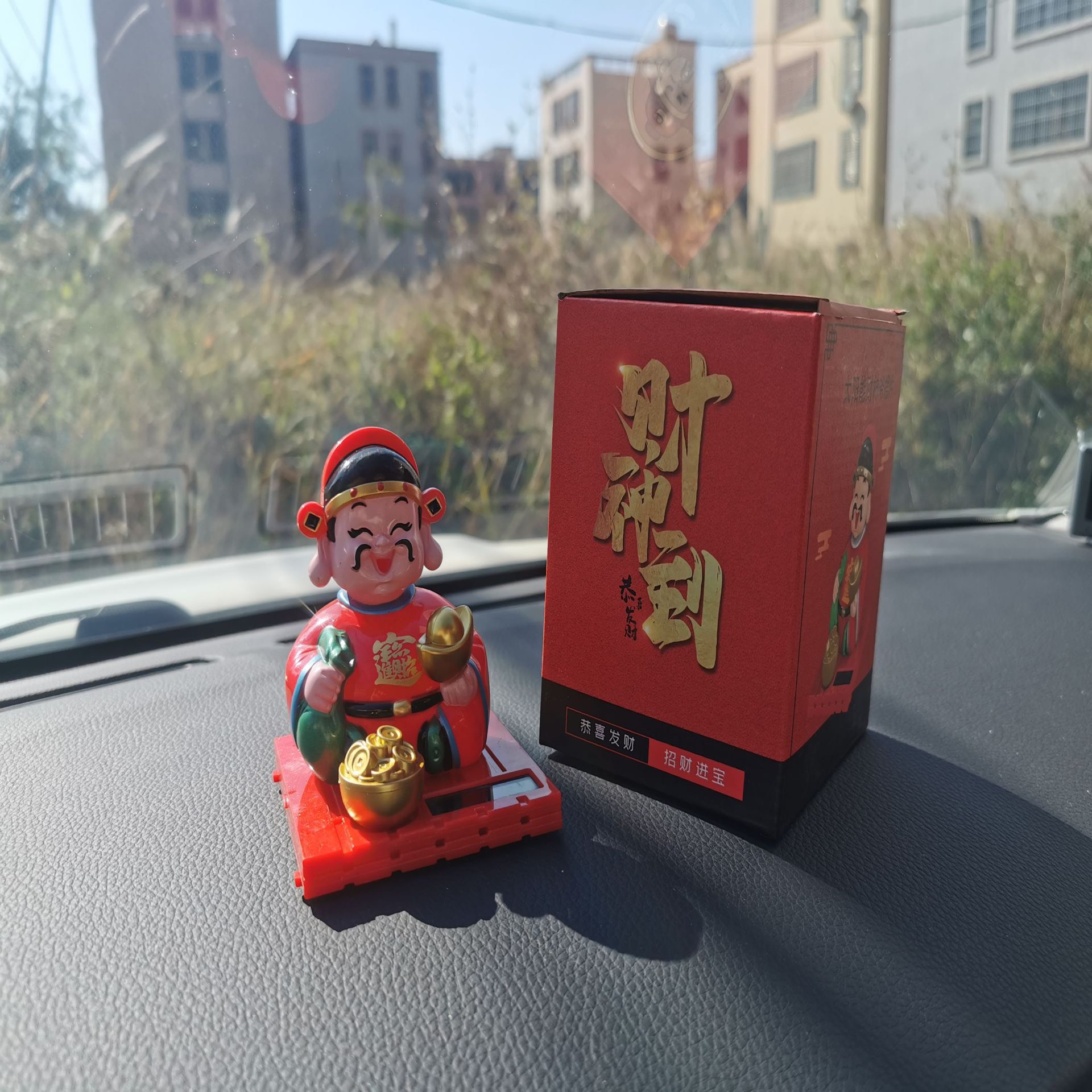 Tượng phật thần tài gật đầu năng lượng