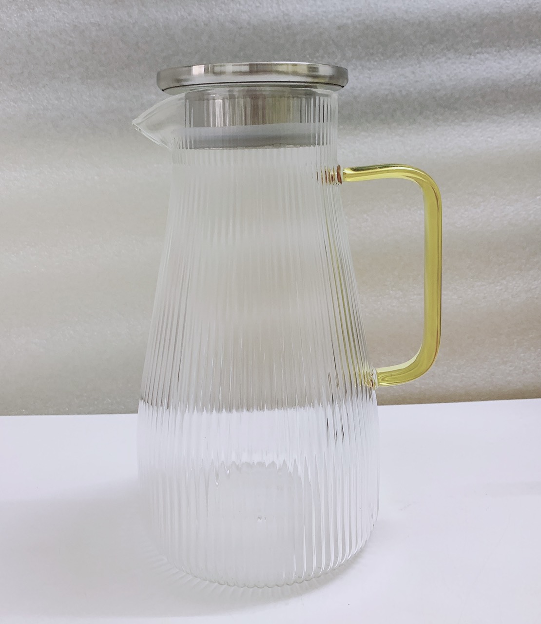 BÌNH ĐỰNG NƯƠC THỦY TINH CHỊU NHIỆT VÂN SỌC NẮP INOX - VD52
