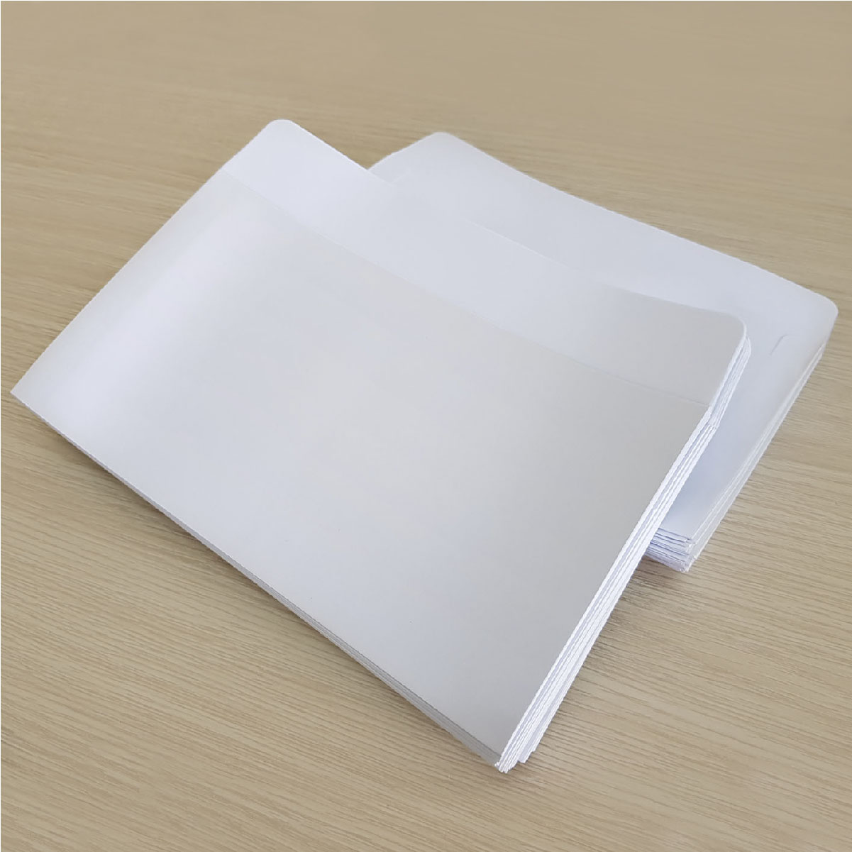 Bao thư trắng giấy dày 12 x 22 cm (xấp 100 cái)