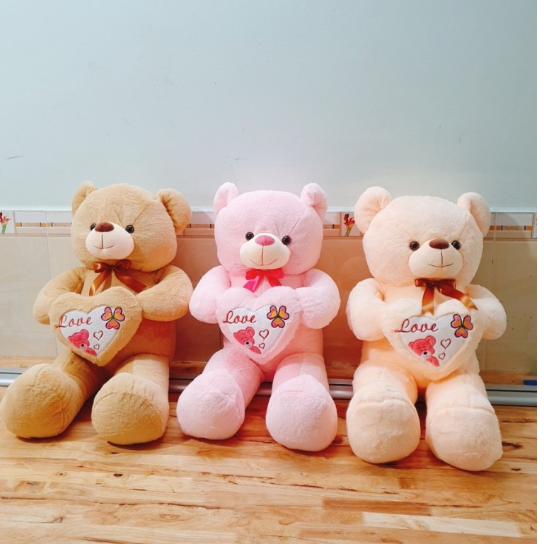 Gấu bông Teddy ôm tim - Size từ 1m1 đến 1m5 - Quà tặng gấu bông teddy vải lông tuyết mịn