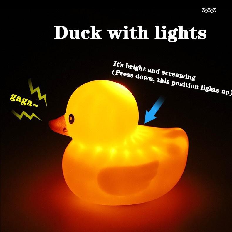 Còi Xe Đạp Hình Vịt Vàng Đội Mũ Bảo Hiểm Có Đèn LED