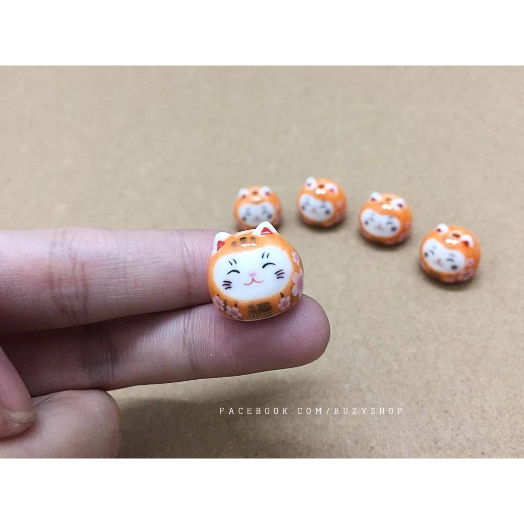 Mèo sứ tròn, mèo may mắn, mèo xỏ vòng - màu cam