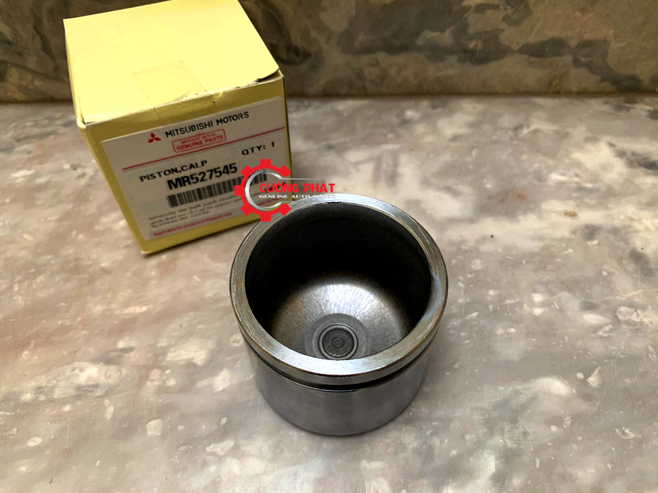 Piston phanh trước Mitsubishi Triton, Pajero Sport 2009-2018 MR527545