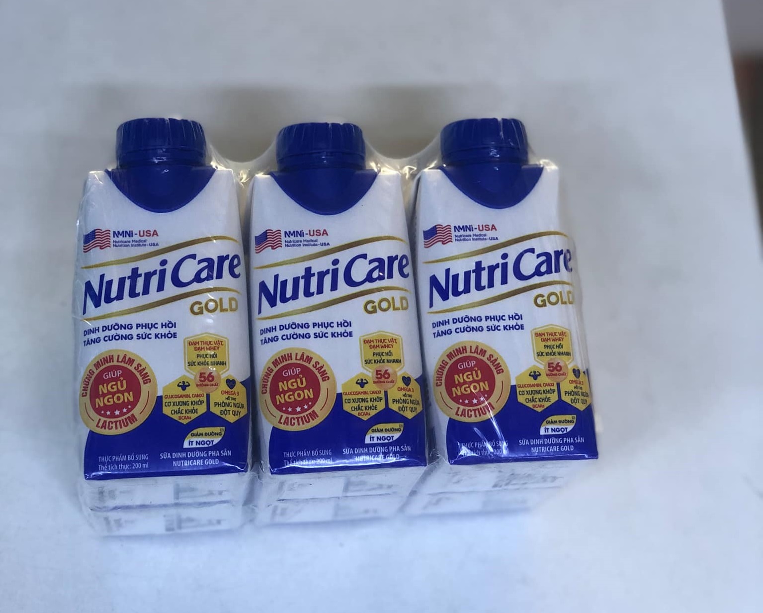 Thùng Sữa pha sẵn bổ sung sức khoẻ Nutricare Gold (18 chai x 200ml) - Dinh dưỡng phục hồi, Tăng cường sức khoẻ