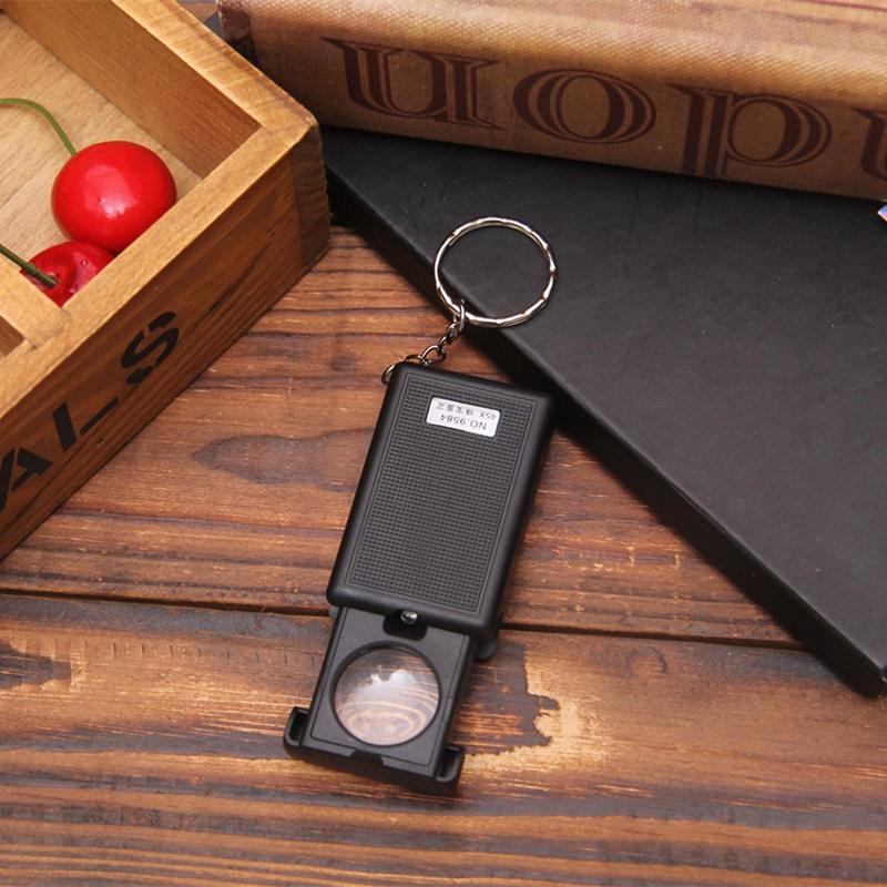 Kính lúp 45X  Kính lúp mini có đèn, có móc treo