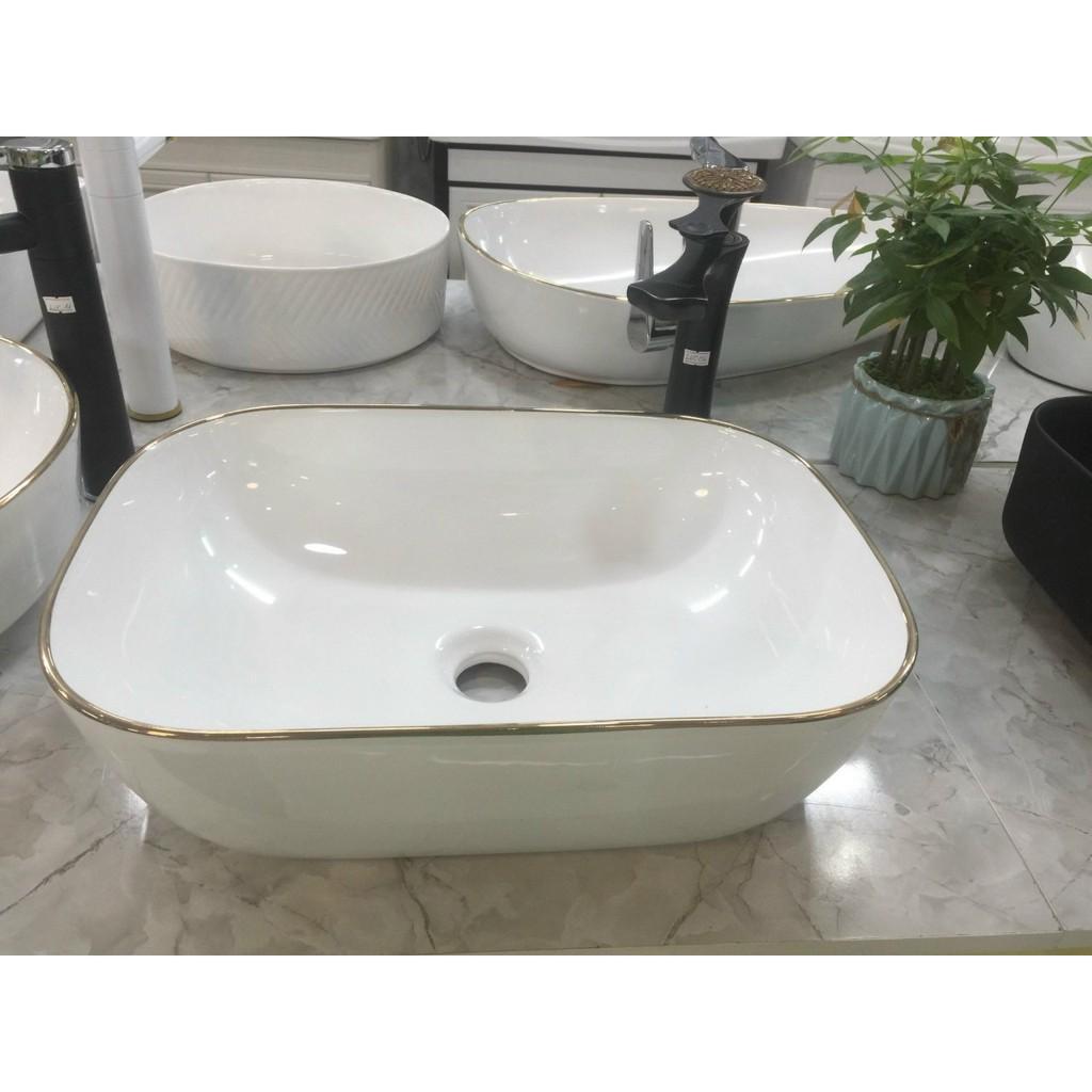 lavabo đặt bàn viền vàng