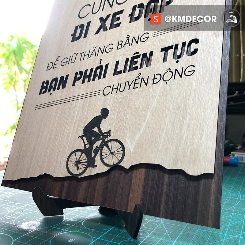 Tran gỗ TBIG - Tạo động lực mẫu câu "cuộc sống cũng như đi xe đạp để giữ thăng bằng bạn phải liên tục chuyển động"