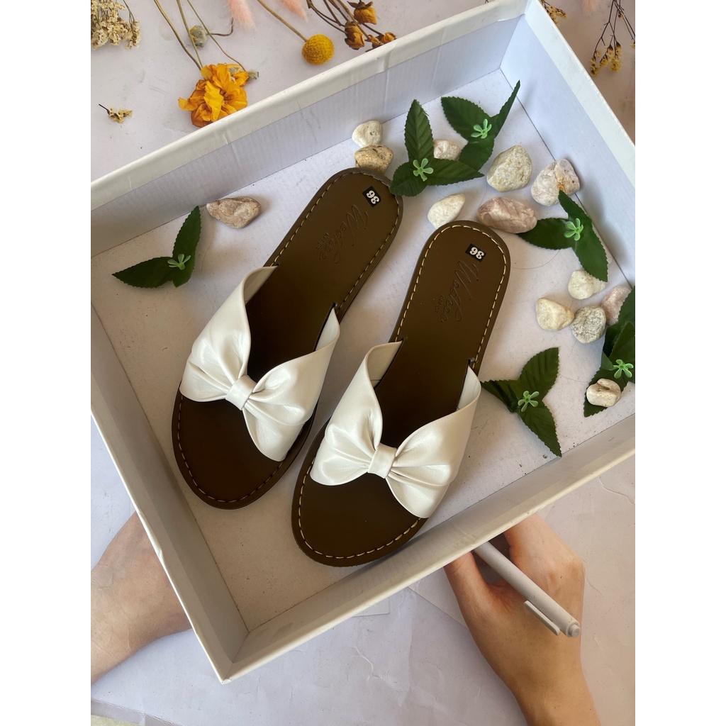 Dép quai ngang nơ nữ đế nâu quai trắng