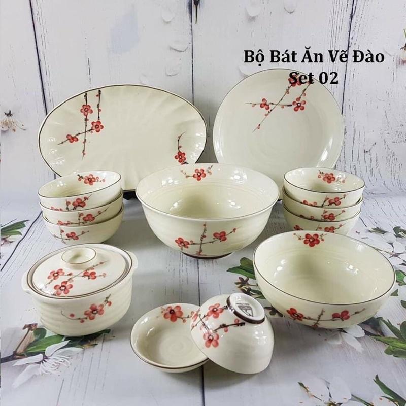 Bộ bát đĩa men kem, họa tiết hoa đào. Gốm sứ