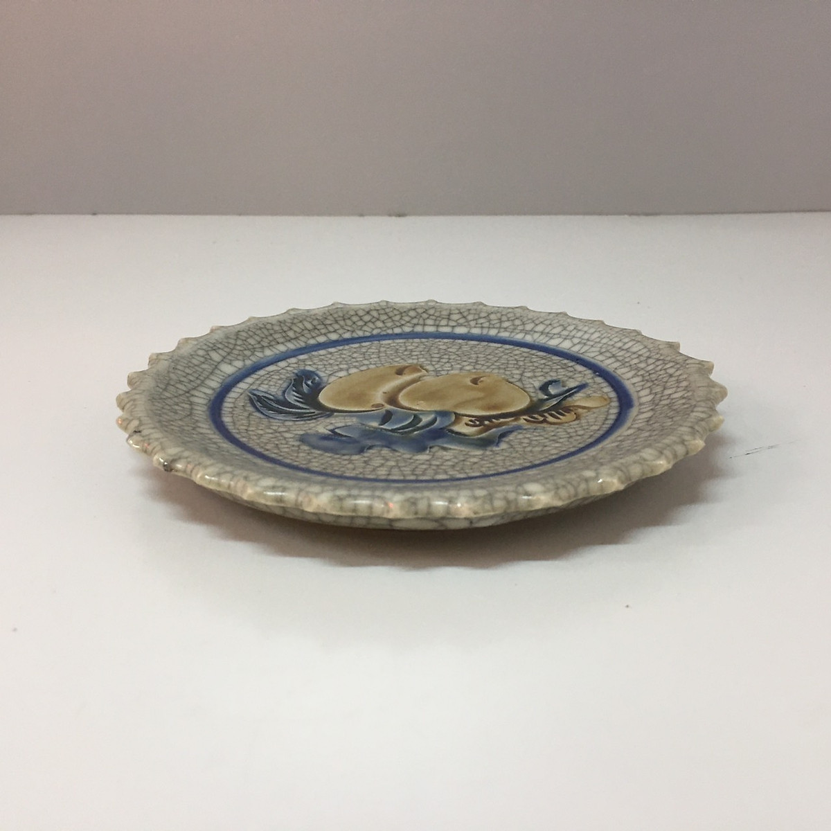 Đĩa trầu men rạng nỗi Đk:14,5cm. Cao:1,5cm KH87233