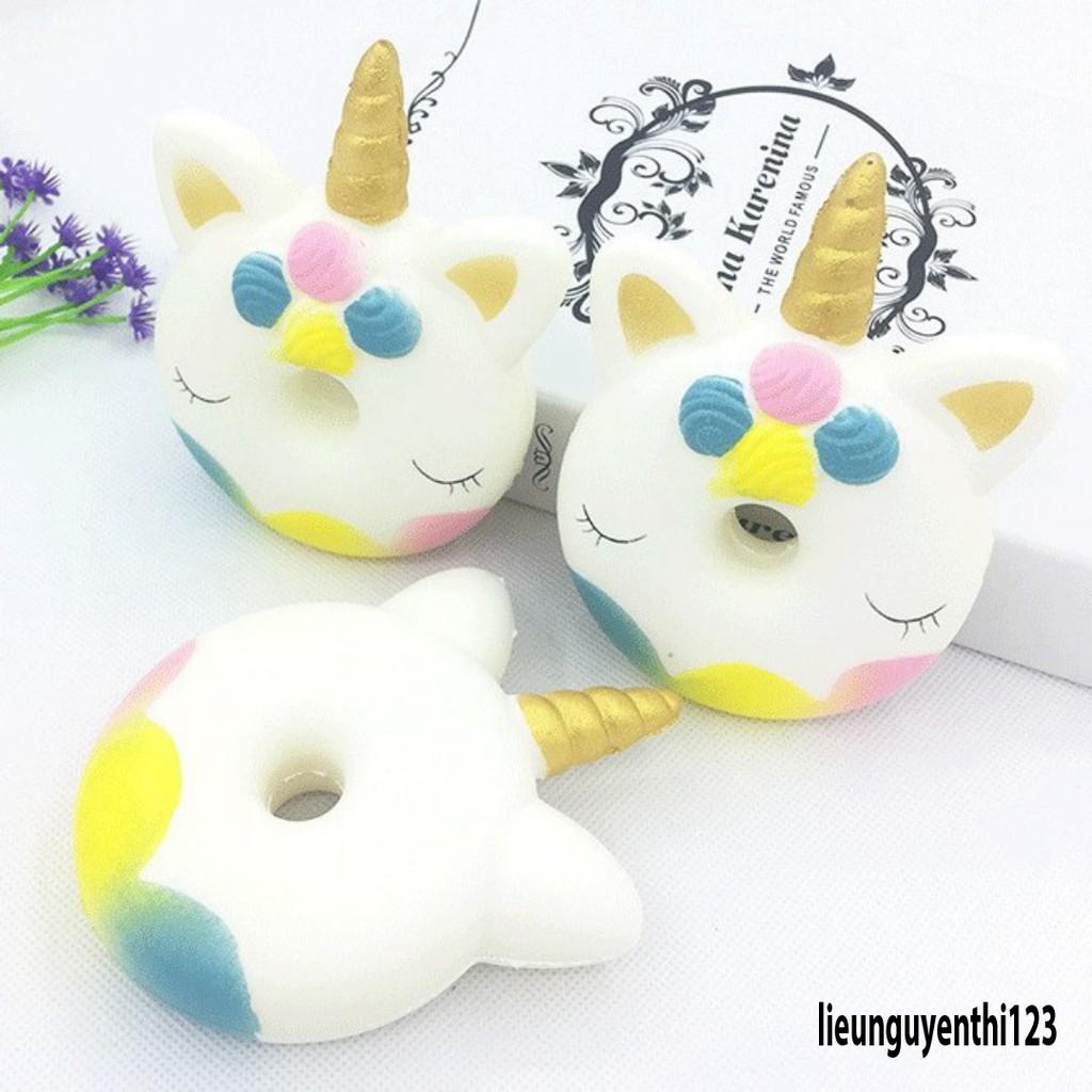 SquiShy bánh tròn 1 sừng nhắm mắt xuôi tay