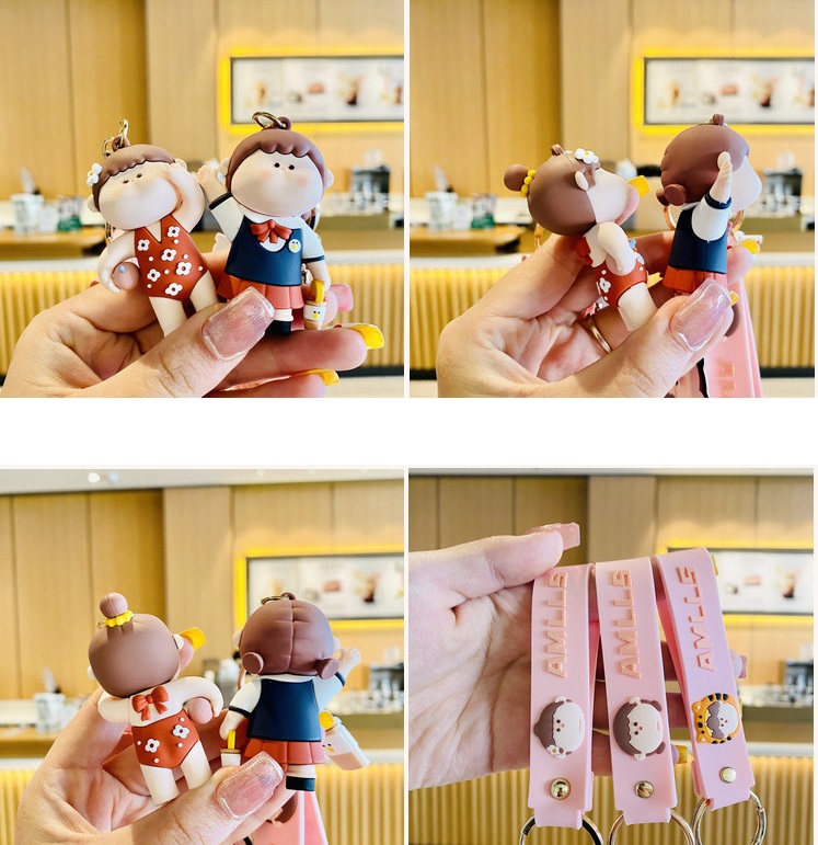 Móc khóa cặp Chàng trai cô gái đi bơi