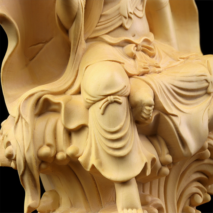 Tượng Phật bà Quan Âm tự tại tựa lá sen bằng gỗ Hoàng Dương C18