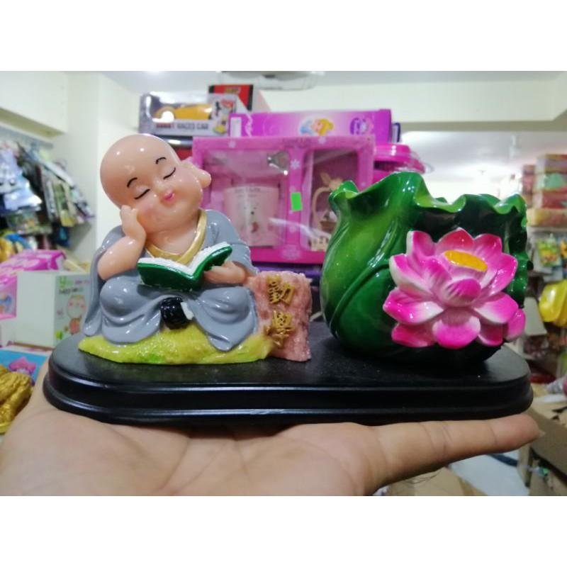 TƯỢNG CHÚ TIỂU ĐỌC SÁCH BÊN CHẬU SEN