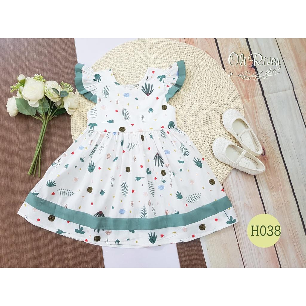 Đầm bé gái Oli River hở lưng hoạ tiết hoa cỏ tay cánh tiên cho bé từ 8 đến 32kg