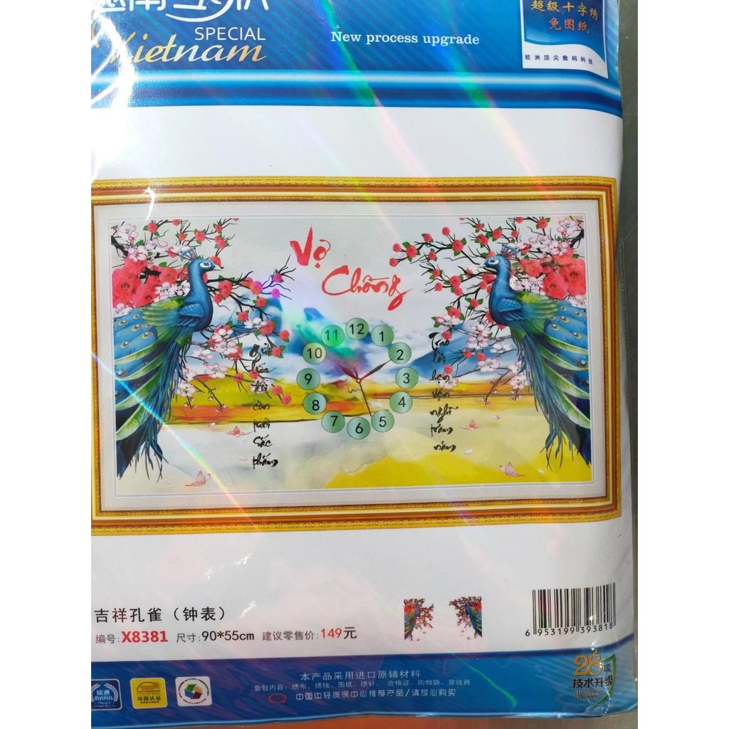 Tranh thêu vợ chồng công xanh đồng hồ X8381 - kích thước: 90 * 55cm.