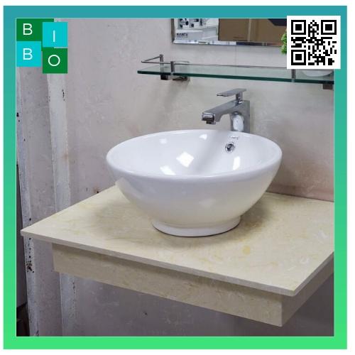 Lavabo tròn đặt bàn màu trắng