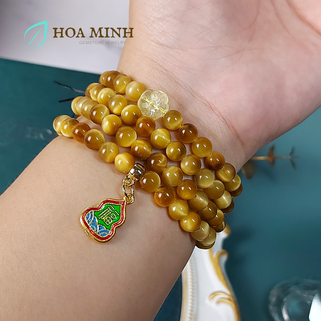 Vòng tay chuỗi Mắt Hổ Vàng Tâm 108 hạt size 6 li An Lạc, phối charm ngôi sao, hoa mai và hồ lô chữ Phúc | Hoa Minh Gem