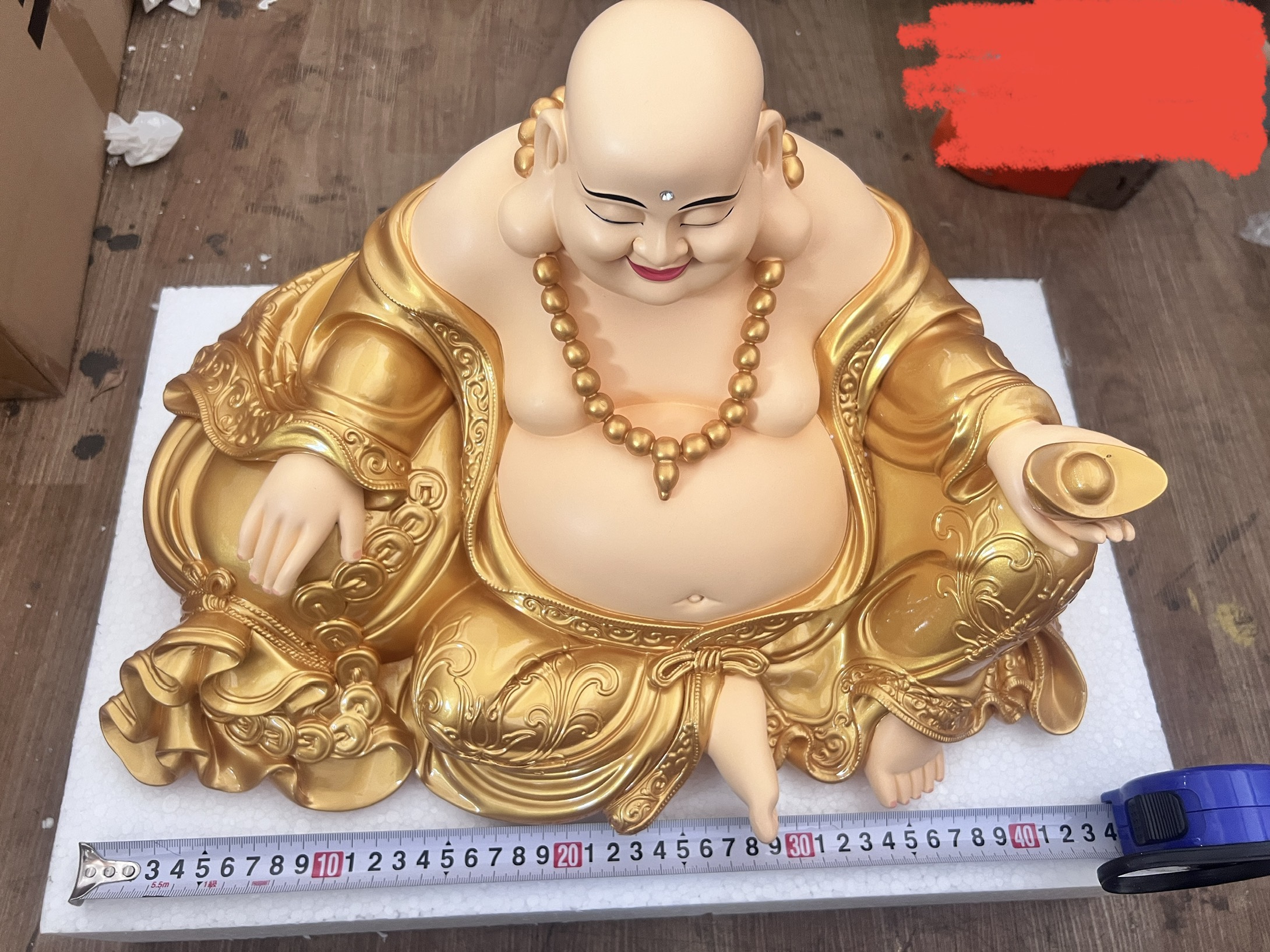 Tượng Phật Di Lặc cao 25cm Cầm ngân lượng