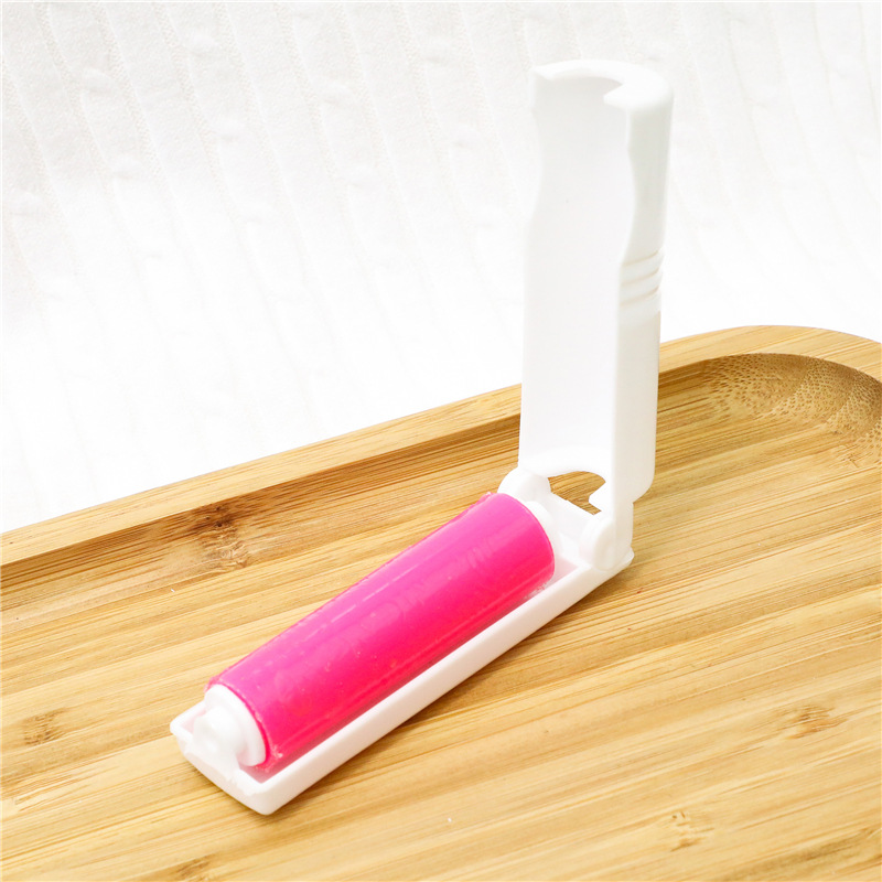 Cây Lăn Bụi Quần Áo Mini Bỏ Túi Gắp Gọn Tiện Dụng