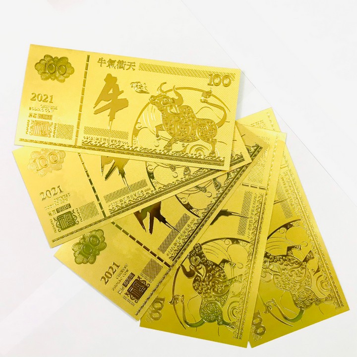 Combo 20 tờ lưu niệm 100 hình con Trâu màu vàng, chất liệu nhựa plastic (loại 2), dùng để trang trí trong nhà, treo cây hoa mai, làm tiền lì xì, quà mừng dịp Lễ, Tết 2021 - TMT Collection - SP005098
