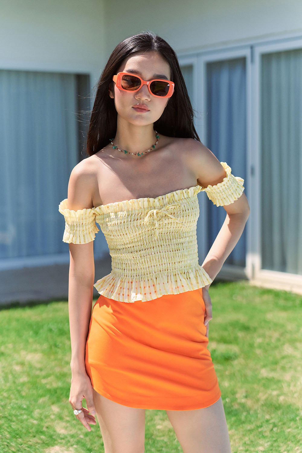 DOTTIE - Chân váy ngắn vạt tròn nữ cam S0127