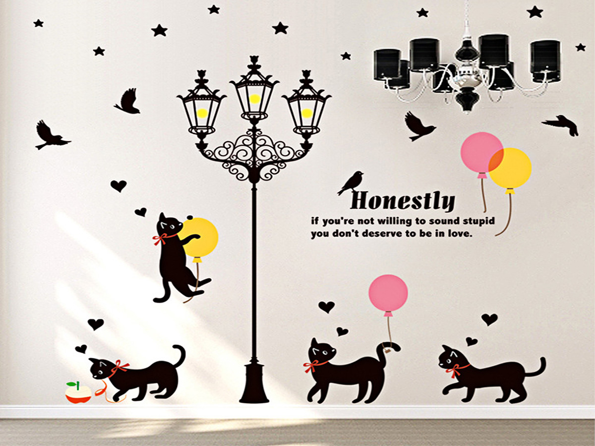 Decal dán tường cột đèn và đàn mèo đen