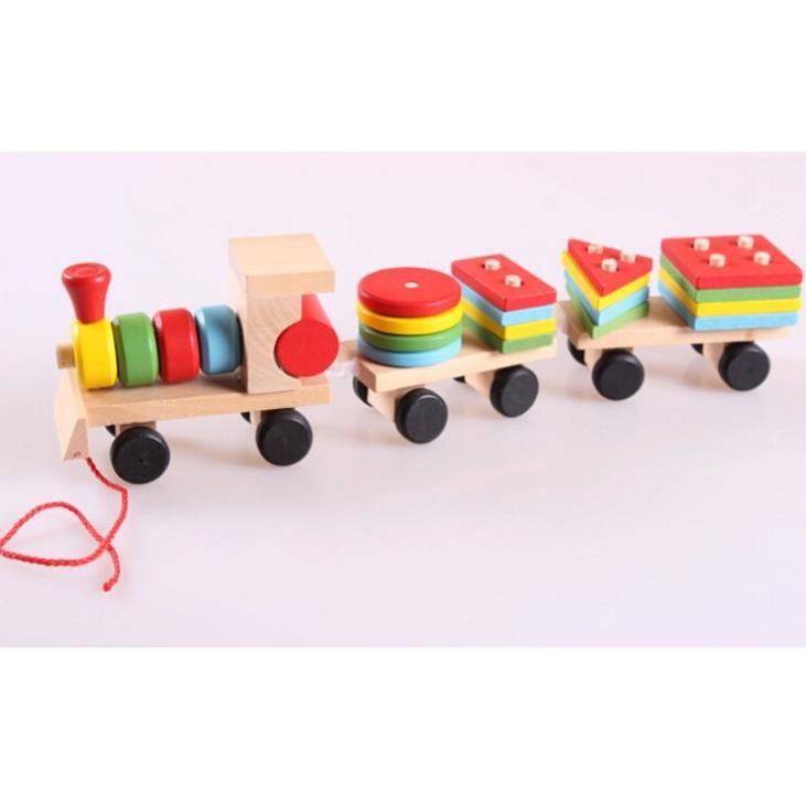 Đồ chơi tàu hỏa chở khối gỗ thả hình trụ cho bé