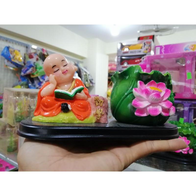 TƯỢNG CHÚ TIỂU ĐỌC SÁCH BÊN CHẬU SEN