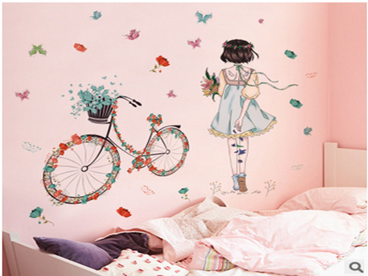 Decal dán tường cô gái quay lưng xe đạp