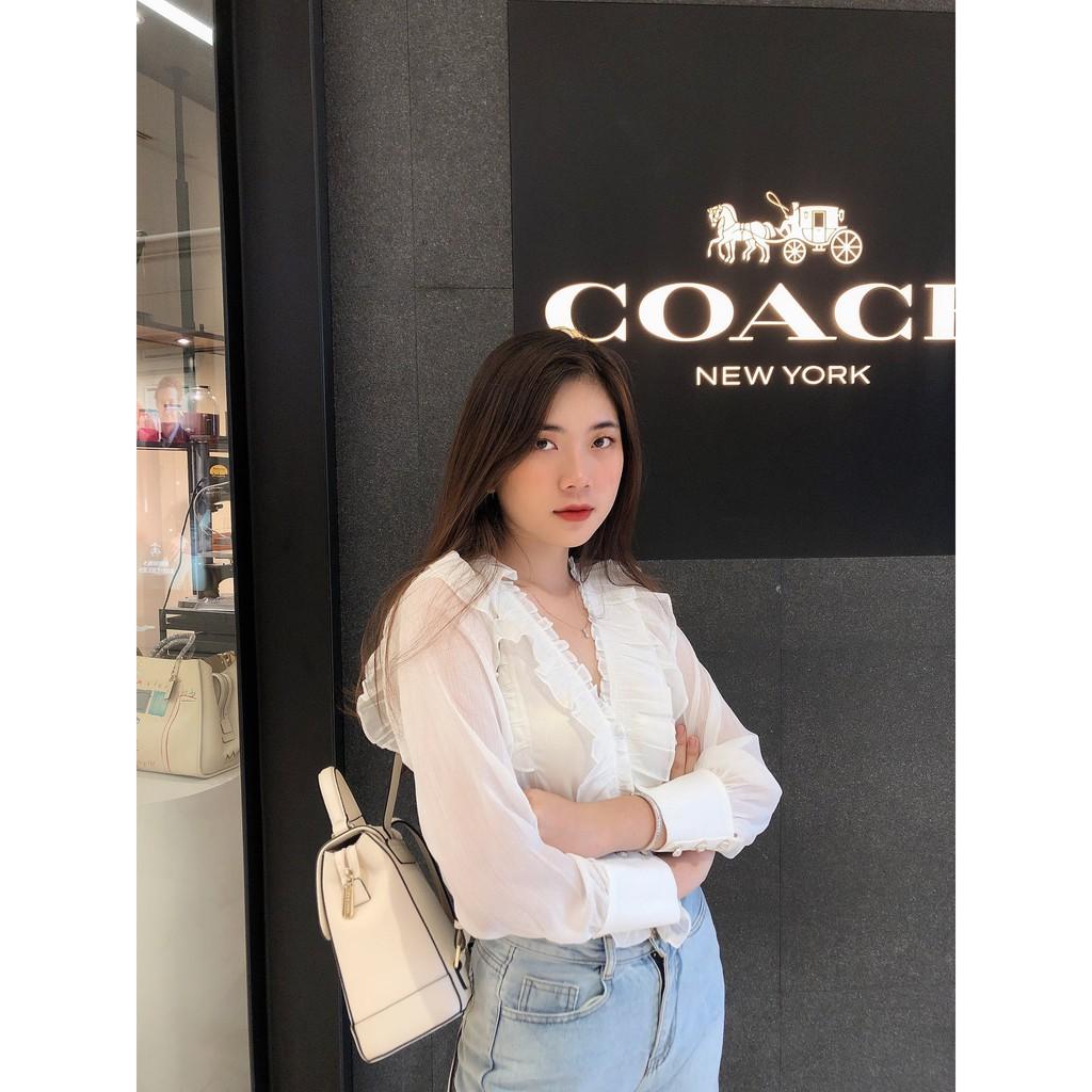 Sơmi kiểu màu trắng