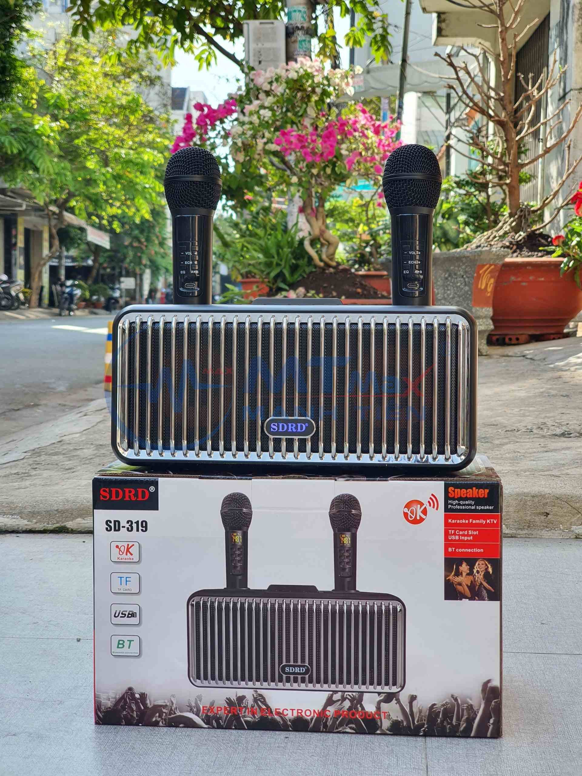 Loa karaoke bluetooth SD319 2 mic âm thanh hay nhỏ gọn phiên bản mới Tặng kèm 2 micro không dây có màn hình LCD - Sạc pin cho micro ngay trên loa - Chỉnh âm lượng ngay trên micro