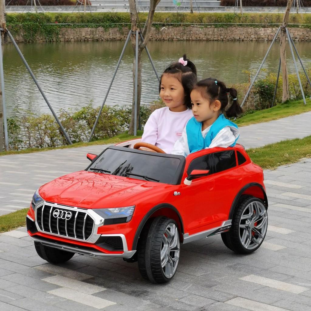 Ô tô điện trẻ em BABY-KID AUDI JM-2088 Đồ chơi vận động ngoài trời cho bé 4 động cơ 2 chỗ ngồi ( ĐỎ - TRẮNG - VÀNG )