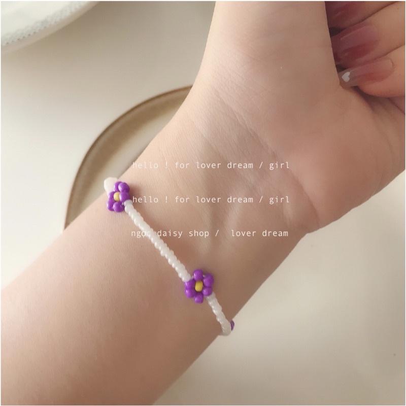 N140 Vòng tay handmade hạt cườm hoa daisy tím dây trắng dễ thương