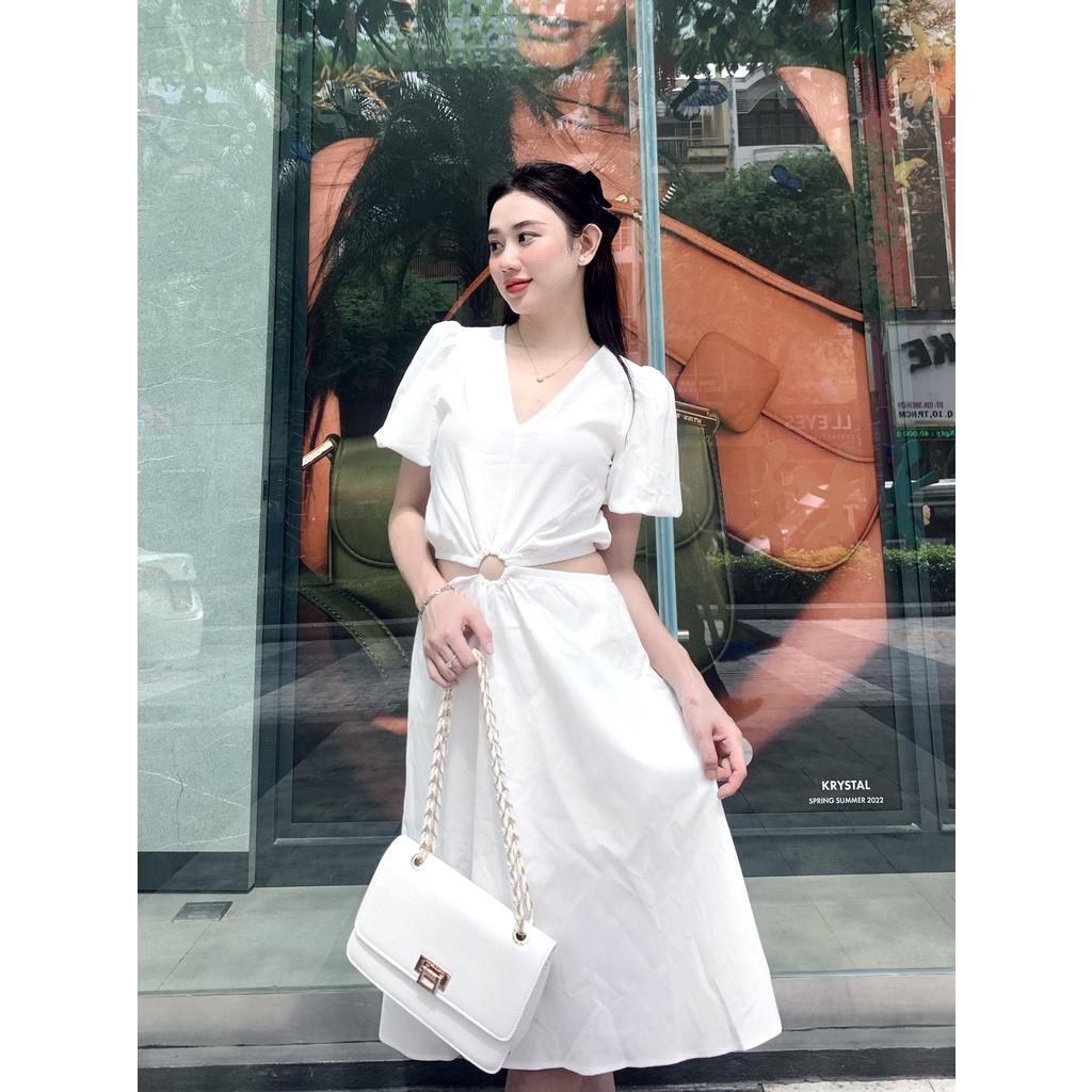 Đầm xòe thô eo nhúm khoen tròn trước bụng hở eo cổ tim tay phồng